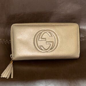 Gucci Metallic Gold Zip-Around Tassel Wallet
